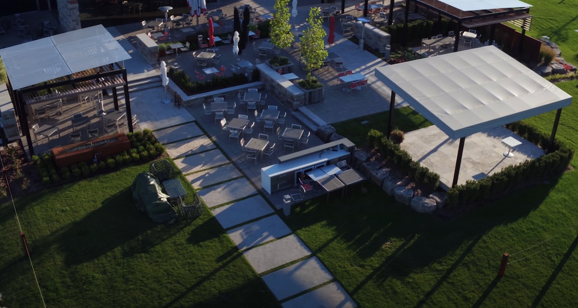 Complete Outdoor Living Design - Pool, Patio, and Landscape Integration Aerial view of modern outdoor living space with pool, patio, and integrated landscaping